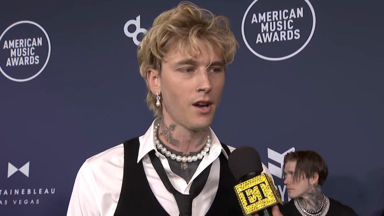 MGK Has ‘Separation Anxiety’ Being Away From Baby Daughter at AMAs (Exclusive) 